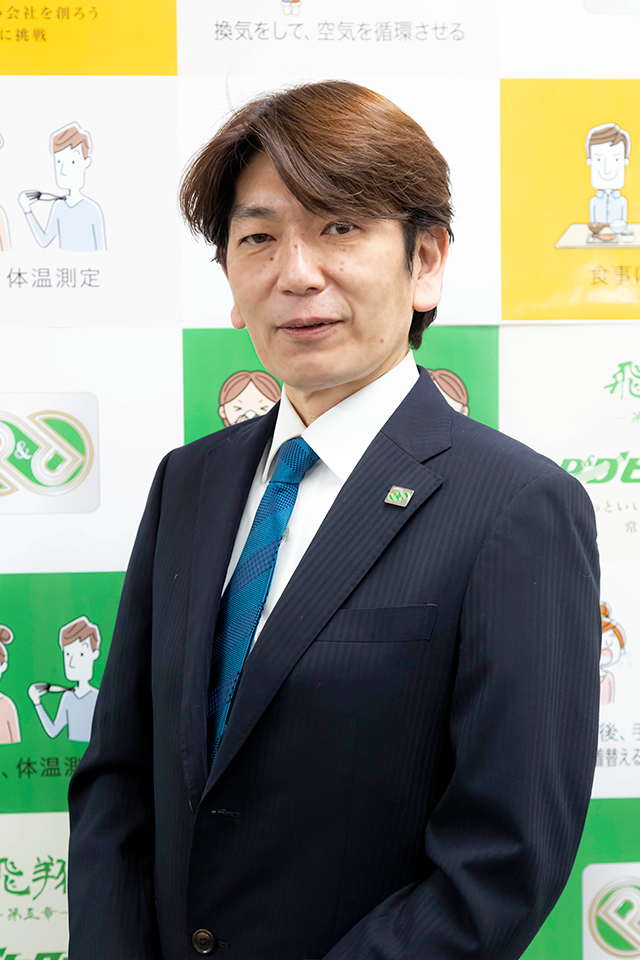 取締役業務部長 廣澤哲也